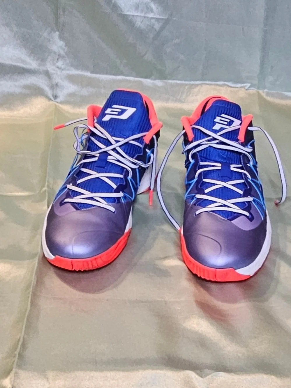 Jordan CP3 VII Independence Days. Blue Athletic Sneakers with Red Accents.